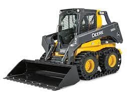 A yellow and black skid steer with tracks on the front